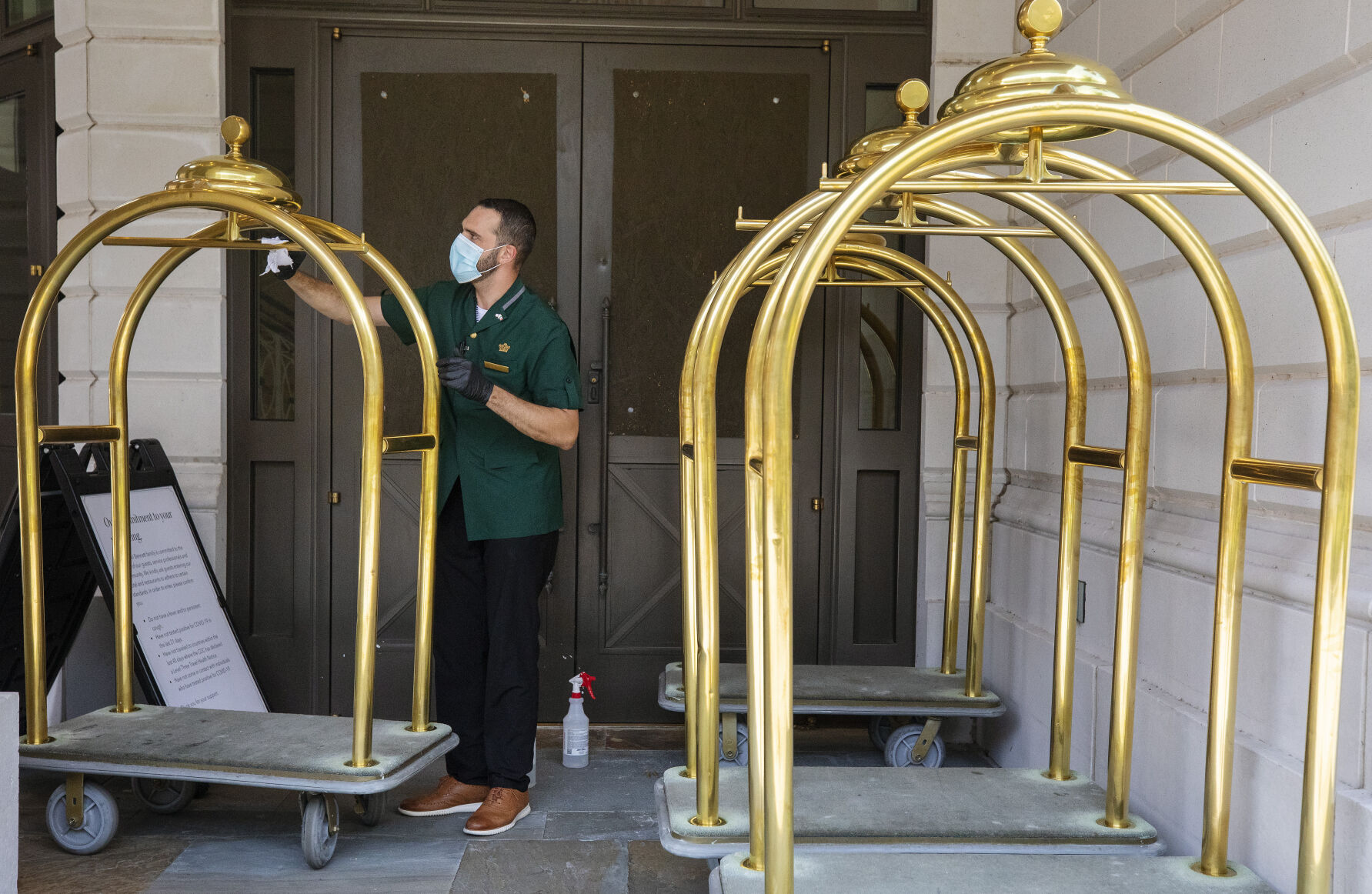 wiping luggage carts.jpg (copy)